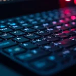 The image shows a gaming laptop with accessories like a mouse and keyboard for better play.